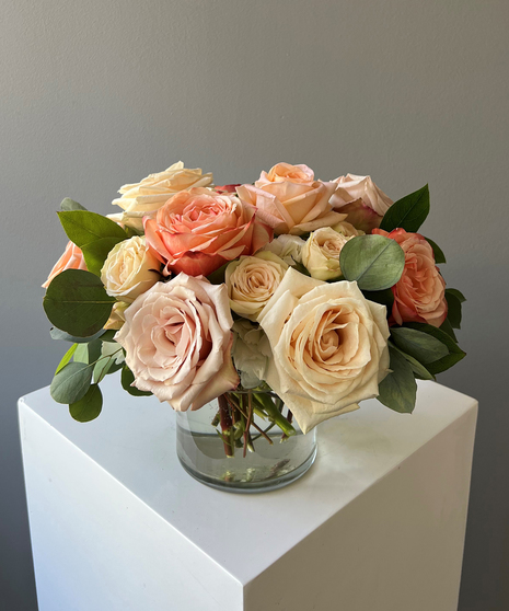 peach and cream floral arrangement