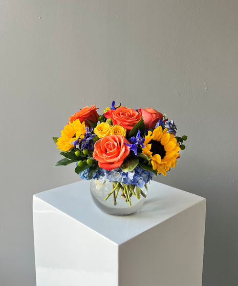 colorful floral arrangement in bubble bowl