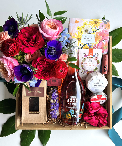 floral arrangement with luxurious gift set