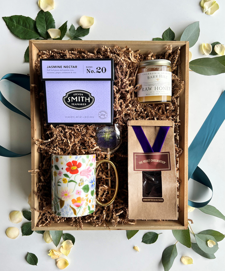 gift set with honey, tea, and chocolates