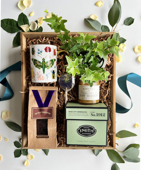 gift set with honey, tea, and chocolates