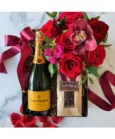 red floral arrangement with wine