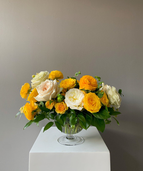 vivid yellow and cream floral arrangement